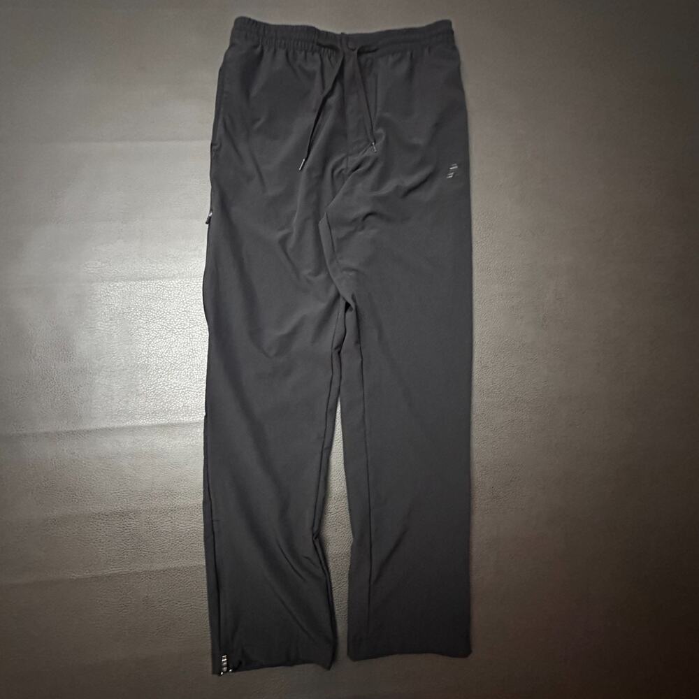 New Balance Pants Mens Medium Black Zip Pockets Ankles Tech Travel Comfort Run